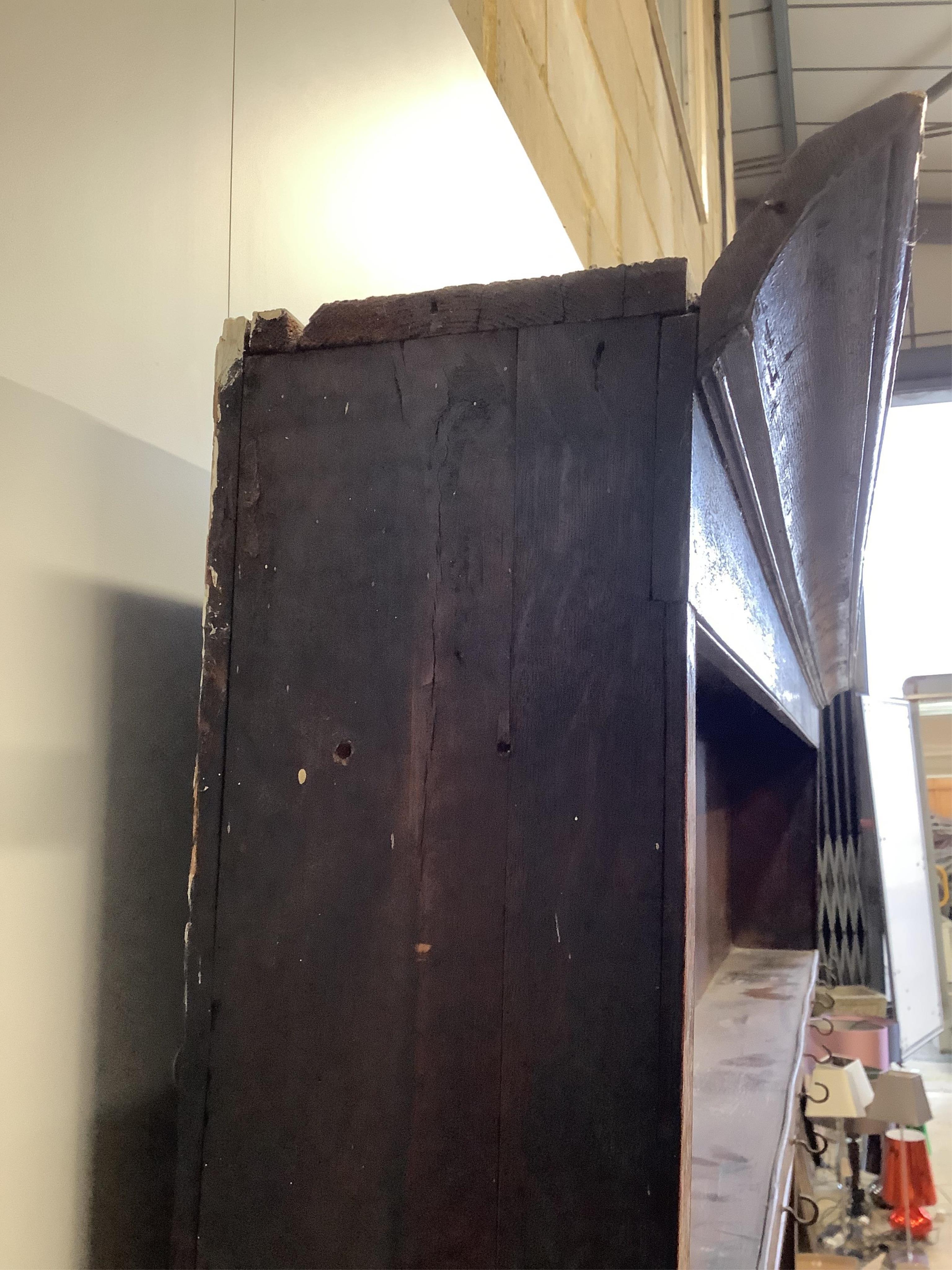 A George III oak dresser with boarded rack, width 168cm, depth 46cm, height 204cm. Condition - poor, lacks back legs